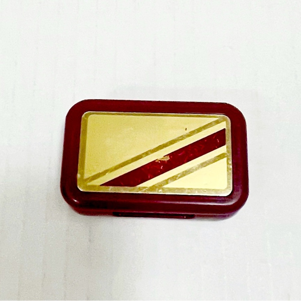 Vintage Avon 1984 pill box maroon gold plastic